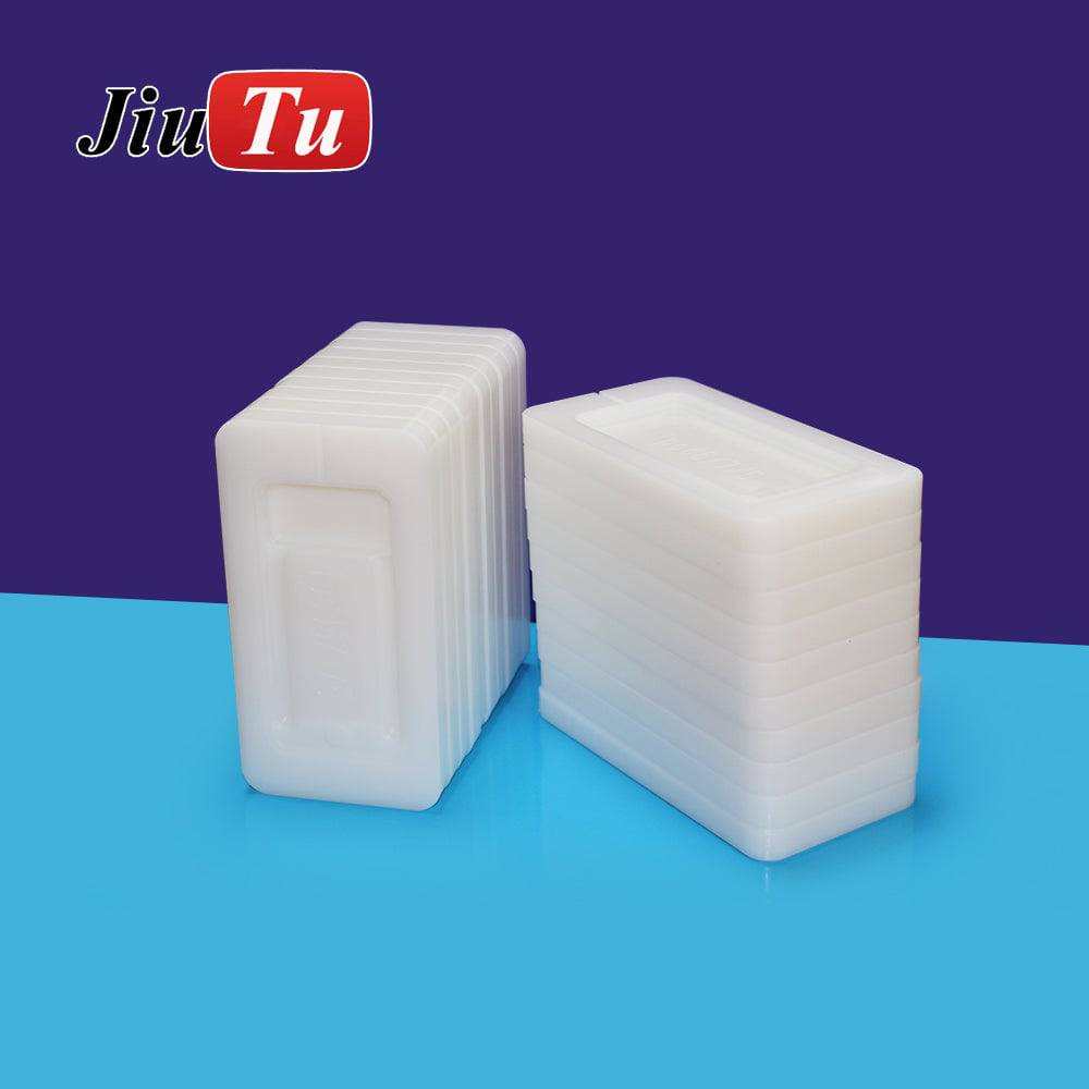 opaque white plastic LCD Polishing Mold sets with rectangular rounded shapes stacked vertically on blue surface